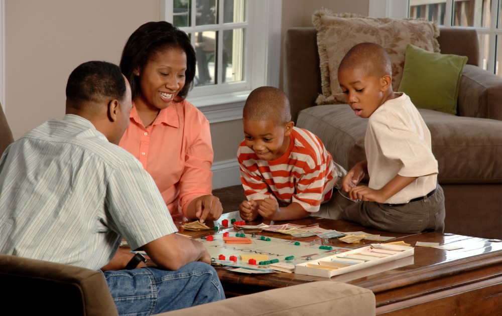 Family Playing Monopoly